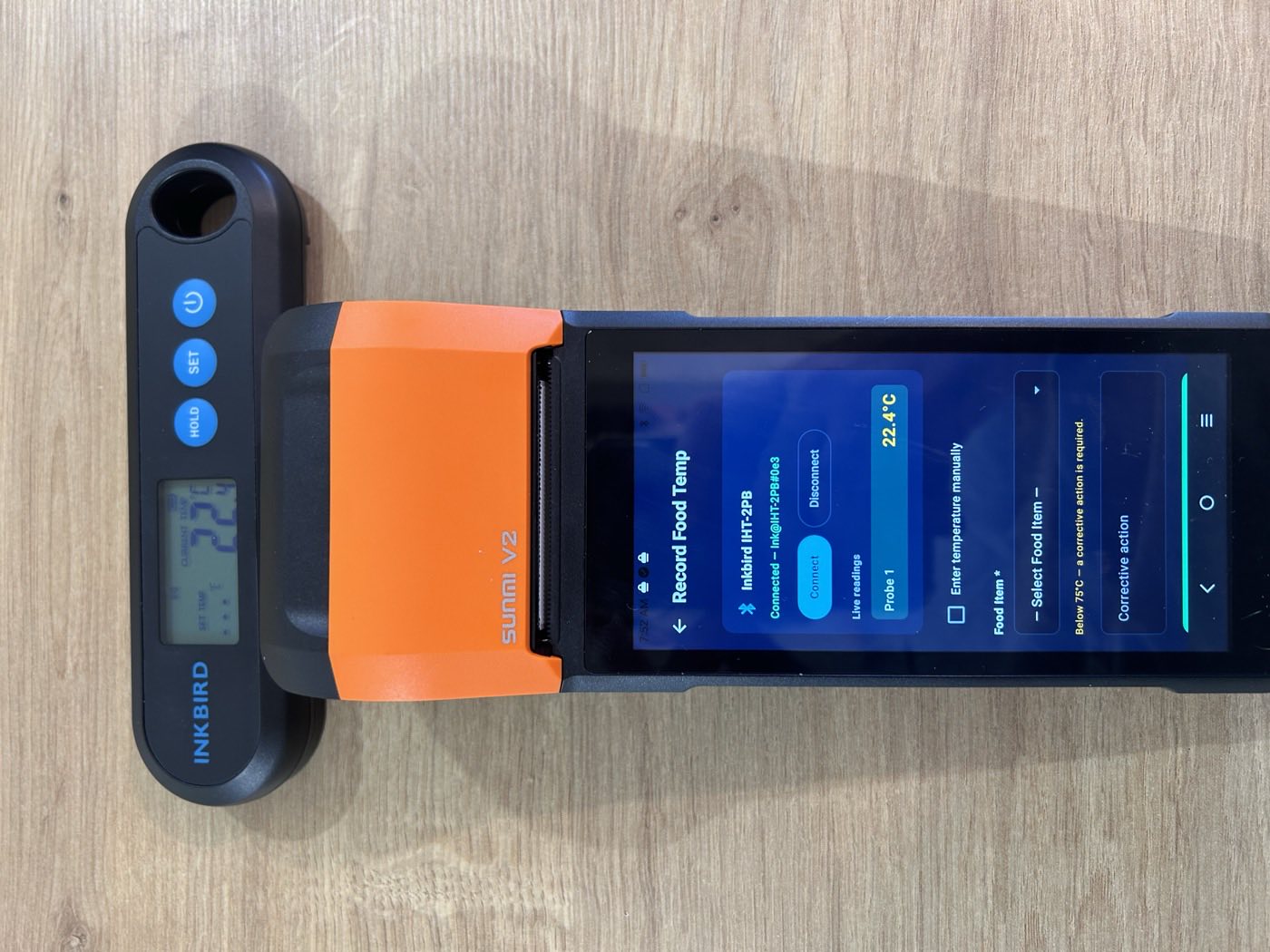Recording a food temperature on the Sunmi V2 with a connected Inkbird IHT-2PB probe showing 22.4°C